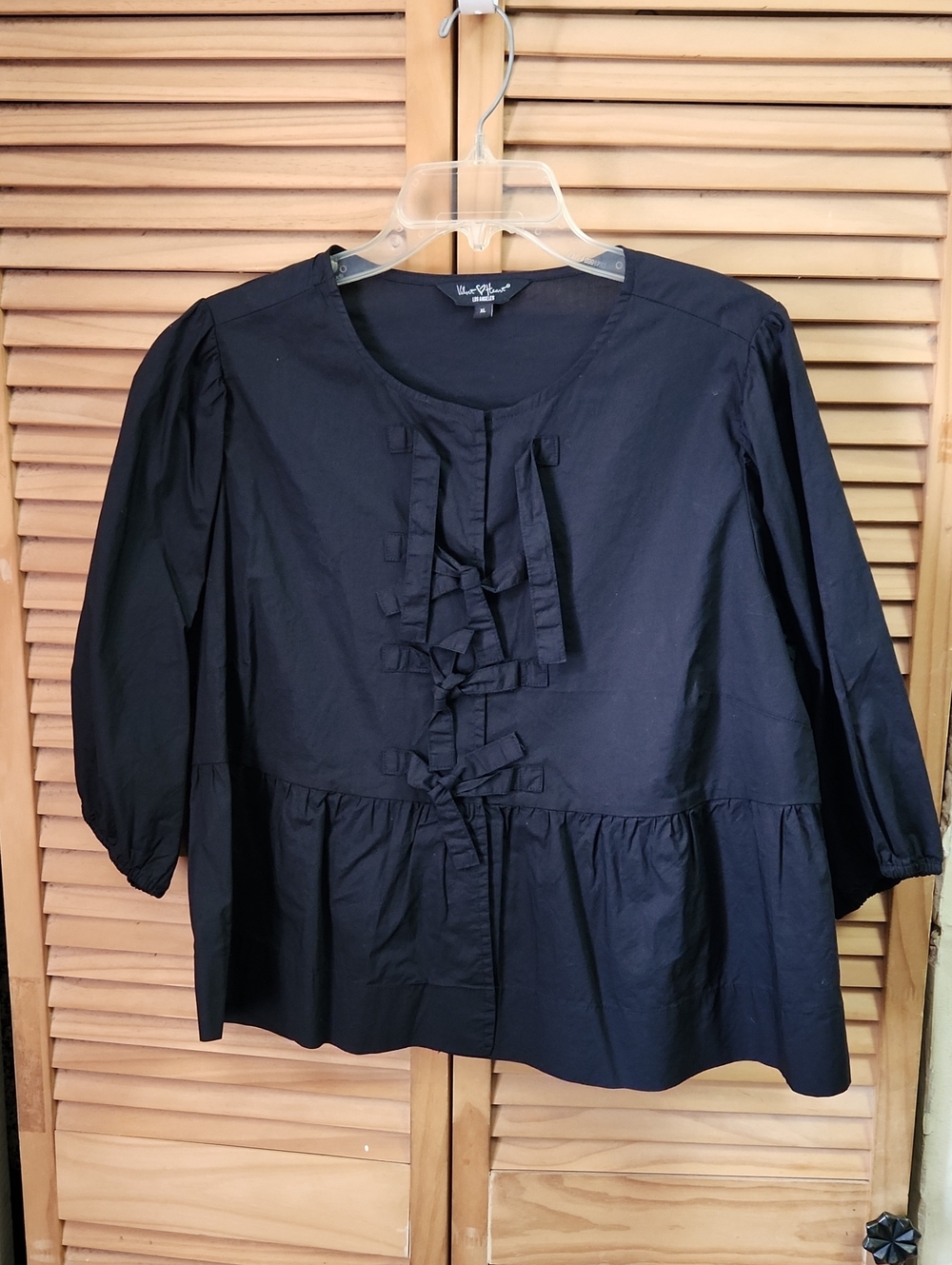 Velvet Heart Black Ruffle-Tie Peplum Top with Bows
